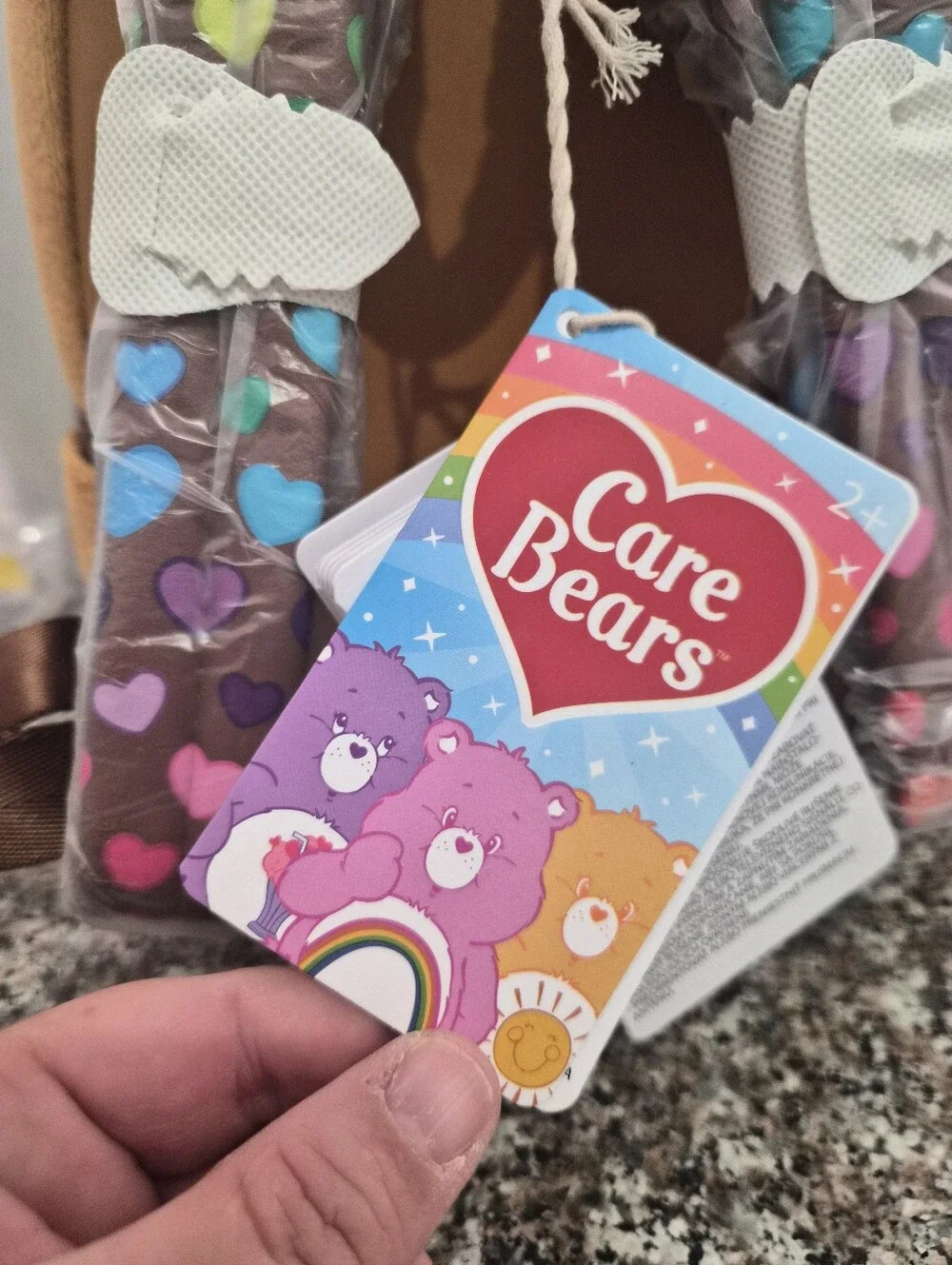Loungefly Care Bear Plush Backpack with Pink Ligh Up Heart.